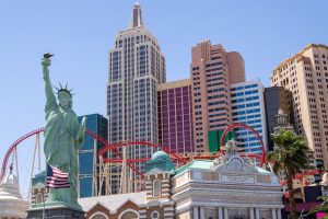 New York-themed Las Vegas attraction featuring Statue of Liberty, Empire State Building, roller coaster and city architecture.